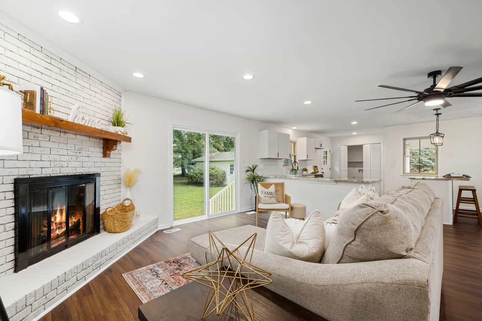 A bright, welcoming living room with natural light and uncluttered surfaces